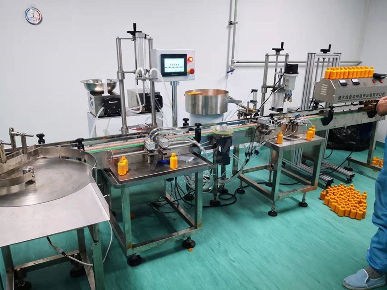 塑料瓶灌裝封口聯(lián)動線 塑料瓶灌裝封口聯(lián)動線